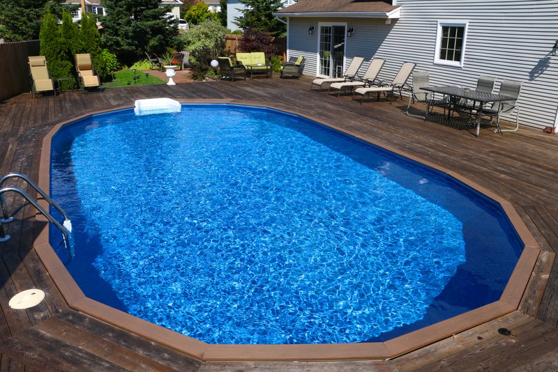 On ground Pool oval shaped with decking from St Lawrence Pools